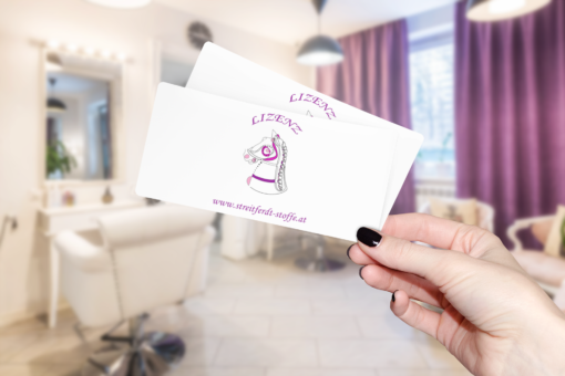mockup of a woman holding two gift vouchers 1600 el